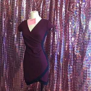 Short sleeved dress in 2 tone burgundy & black in small by ALMOST FAMOUS